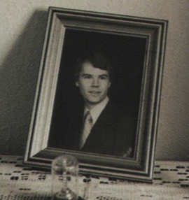 A framed photo of young Tim Scoggin